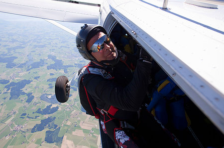 Man about to skydive from plane Stock Photo - Premium Royalty-Free, Code: 649-09206482