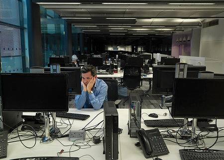 Businessman working late in office Stock Photo - Premium Royalty-Free, Code: 649-09206655