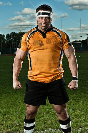 Rugby player on pitch, portrait Stock Photo - Premium Royalty-Free, Code: 649-09206887