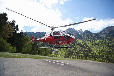 Helicopter taking of from helipad, Interlaken, Berne, Switzerland Stock Photo - Premium Royalty-Free, Code: 649-09207741