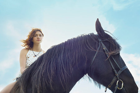 simsearch:649-09207875,k - Portrait of young woman on horse Foto de stock - Sin royalties Premium, Código: 649-09208067