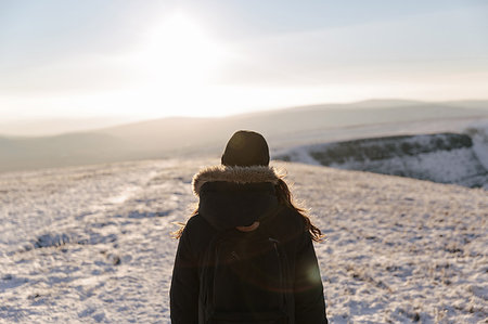 Mid adult woman looking at view, Llyn y Fan Fach, Brecon Beacons, Wales Stock Photo - Premium Royalty-Free, Code: 649-09208247