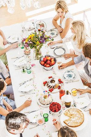 parents and grandparents birthday party - Overhead view of family at birthday party in dining room Stock Photo - Premium Royalty-Free, Code: 649-09208308