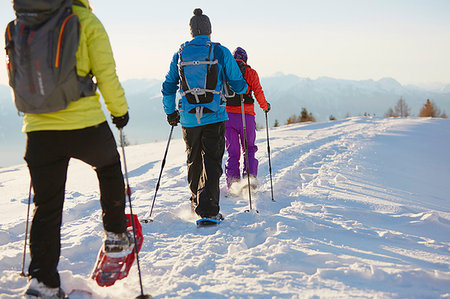 simsearch:854-03537981,k - Three mid adult friends snowshoeing in Dolomite mountains, Eisack Valley, South Tyrol, Italy Stock Photo - Premium Royalty-Free, Code: 649-09208501