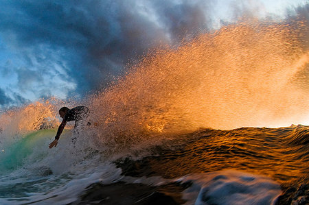 Surfer at sunset, Rilleys, Kilkee, Clare, Ireland Foto de stock - Sin royalties Premium, Código: 649-09208703