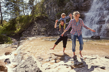 fun waterfall - Two generation family having fun by waterfall, Ehrwald, Tyrol, Austria Stock Photo - Premium Royalty-Free, Code: 649-09208900