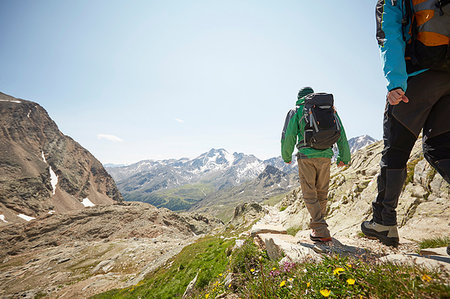 simsearch:649-08949532,k - Rear view of young hiking couple at Val Senales Glacier, Val Senales, South Tyrol, Italy Stock Photo - Premium Royalty-Free, Code: 649-09208930