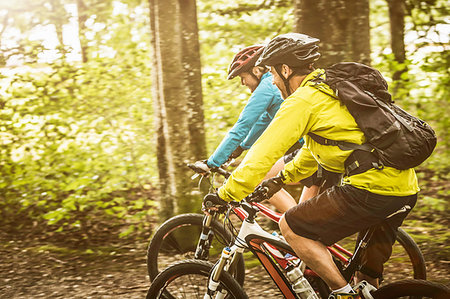 simsearch:649-08086063,k - Mature mountain biking couple cycling in forest Stock Photo - Premium Royalty-Free, Code: 649-09209669