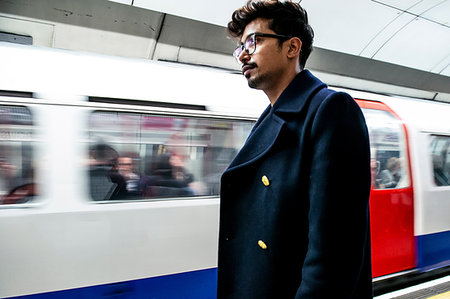 Businessman waiting on platform of subway station, London, UK Stock Photo - Premium Royalty-Free, Code: 649-09212929