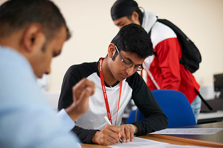 simsearch:649-09061513,k - Lecturer talking to college students in classroom Stock Photo - Premium Royalty-Free, Code: 649-09230284