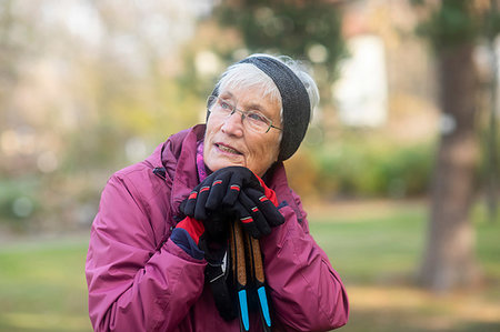 Senior woman resting from walk in park Stock Photo - Premium Royalty-Free, Code: 649-09230838