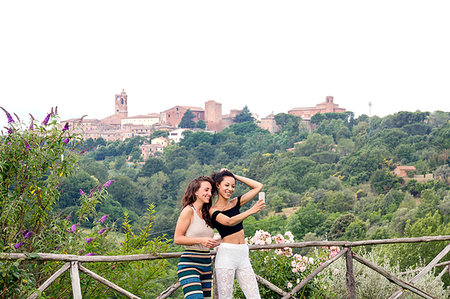 Friends taking selfie, Città della Pieve, Umbria, Italy Stock Photo - Premium Royalty-Free, Code: 649-09245764