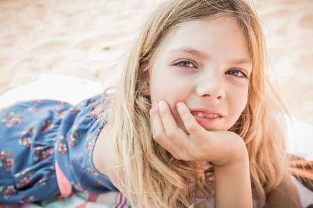 Girl lying on beach, portrait, Los Angeles, USA Stock Photo - Premium Royalty-Free, Code: 649-09245832