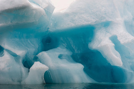 simsearch:6119-09252649,k - Blue iceberg, detail, Burgerbukta, Spitsbergen, Svalbard, Norway Foto de stock - Sin royalties Premium, Código: 649-09246253