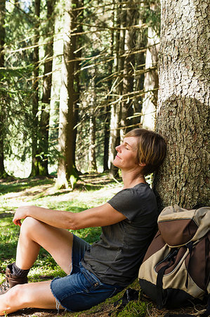 simsearch:649-09208838,k - Woman relaxing in forest, Sonthofen, Bayern, Germany Stock Photo - Premium Royalty-Free, Code: 649-09246343
