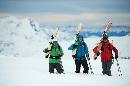 simsearch:649-07280230,k - Landscape with three male skiers carrying skis, portrait, Alpe-d'Huez, Rhone-Alpes, France Photographie de stock - Premium Libres de Droits, Code: 649-09246658