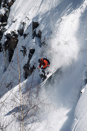 simsearch:614-08876182,k - Male skier speeding down rugged vertical mountainside, Alpe-d'Huez, Rhone-Alpes, France Photographie de stock - Premium Libres de Droits, Code: 649-09246650