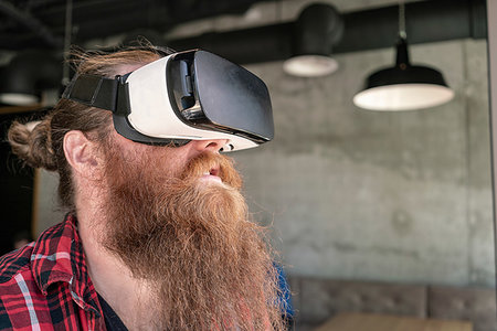 simsearch:649-08125288,k - Male hipster using VR goggles Stock Photo - Premium Royalty-Free, Code: 649-09246817
