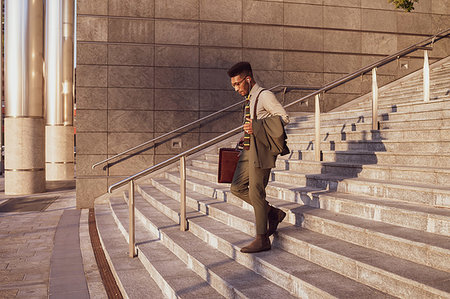 simsearch:649-09257363,k - Businessman descending stairs of office building, Milano, Lombardia, Italy Stockbilder - Premium RF Lizenzfrei, Bildnummer: 649-09257367