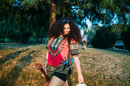 simsearch:649-09257797,k - Young woman with guitar in park Photographie de stock - Premium Libres de Droits, Code: 649-09257813