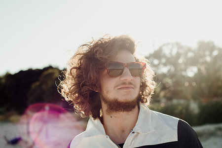 Young man enjoying hot sunny day Stock Photo - Premium Royalty-Free, Code: 649-09258009