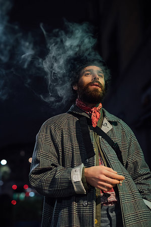 depression free - Bearded young man loitering on street Stock Photo - Premium Royalty-Free, Code: 649-09258347