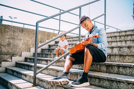 simsearch:649-09250129,k - Toddler watching father play guitar on stairway Stock Photo - Premium Royalty-Free, Code: 649-09250130