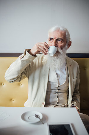 simsearch:649-09251527,k - Senior businessman drinking coffee in cafe Stock Photo - Premium Royalty-Free, Code: 649-09251540