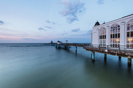 pier with restaurant in sellin - Traditional pier at dusk, side view, Sellin, Rugen, Mecklenburg-Vorpommern, Germany Stock Photo - Premium Royalty-Free, Code: 649-09251889