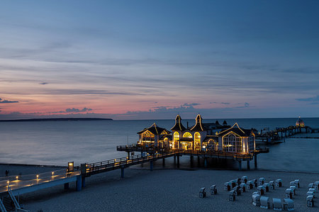 pier with restaurant in sellin - Traditional pier illuminated at sunset, elevated view, Sellin, Rugen, Mecklenburg-Vorpommern, Germany Stock Photo - Premium Royalty-Free, Code: 649-09251891