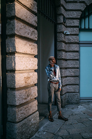 simsearch:649-09269226,k - Stylish man using cellphone by period building, Milan, Italy Stock Photo - Premium Royalty-Free, Code: 649-09269234