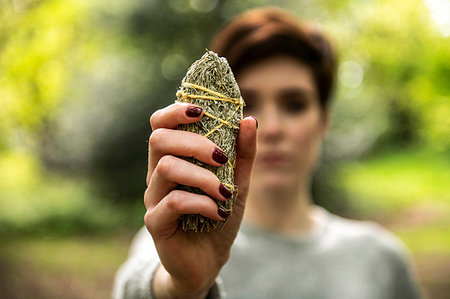 Woman holding healing stone for Reiki Stock Photo - Premium Royalty-Free, Code: 649-09269292