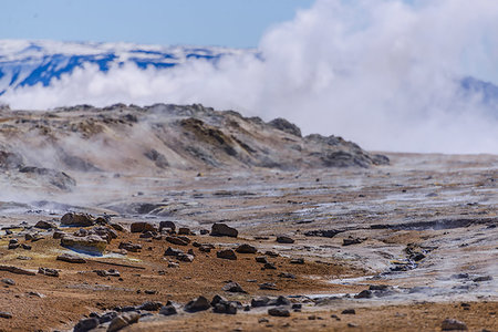 fumarole - Barren landscape with steam rising beyond rocks, Akureyri, Eyjafjardarsysla, Iceland Stock Photo - Premium Royalty-Free, Code: 649-09275670