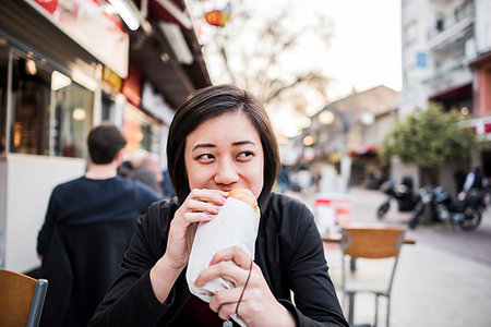 simsearch:649-09276061,k - Woman eating kebab bread at cafe, Kusadasi, Izmir, Turkey Photographie de stock - Premium Libres de Droits, Code: 649-09276070