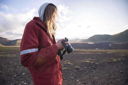 Hiker looking at camera, Landmannalaugar, Highlands, Iceland Stock Photo - Premium Royalty-Free, Code: 649-09277805