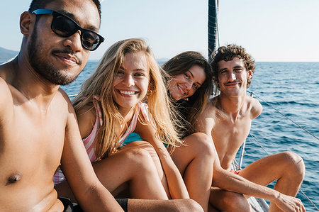 simsearch:649-09278006,k - Friends relaxing on sailboat, Italy Stock Photo - Premium Royalty-Free, Code: 649-09278031