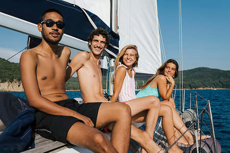 simsearch:649-09278006,k - Friends relaxing on sailboat, Italy Stock Photo - Premium Royalty-Free, Code: 649-09278042