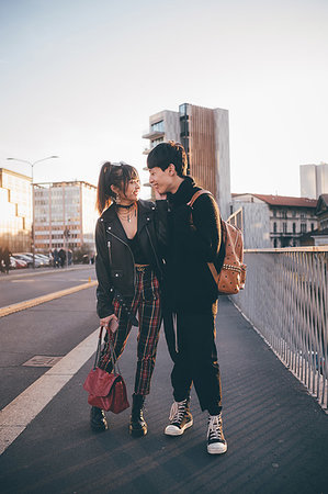 simsearch:649-09278133,k - Young couple walking on street, Milan, Italy Photographie de stock - Premium Libres de Droits, Code: 649-09278130