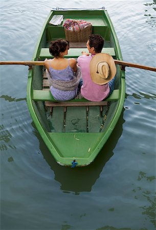 picnic people sitting top view - Man and woman in a boat Stock Photo - Premium Royalty-Free, Code: 649-01608481