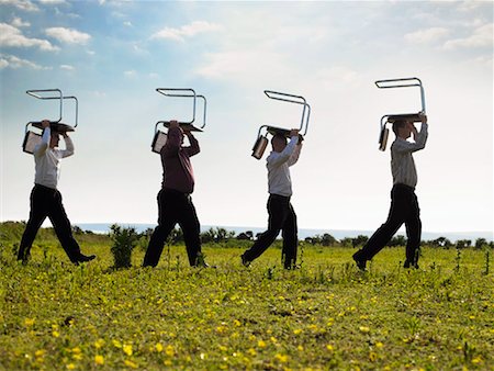 simsearch:695-03374588,k - Businessmen walking through field with chairs. Stock Photo - Premium Royalty-Free, Code: 649-01609471