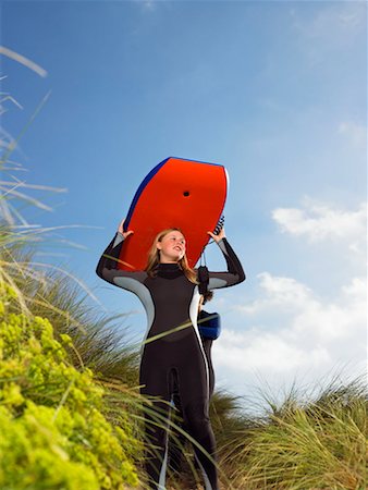 england beach one person - Female wearing a wetsuit. Stock Photo - Premium Royalty-Free, Code: 649-01754925