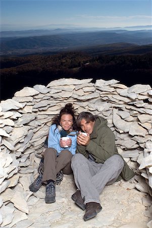 fitness female france outdoor - Couple having a hot drink. Stock Photo - Premium Royalty-Free, Code: 649-01755058