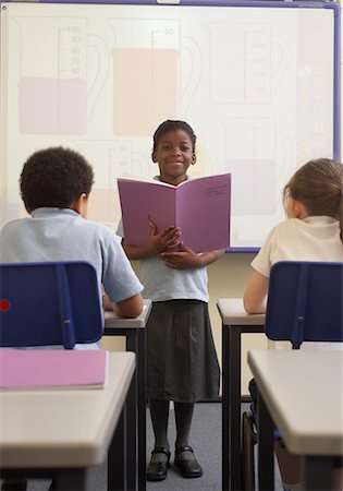 Girl doing her presentation in class Stock Photo - Premium Royalty-Free, Code: 649-02055497