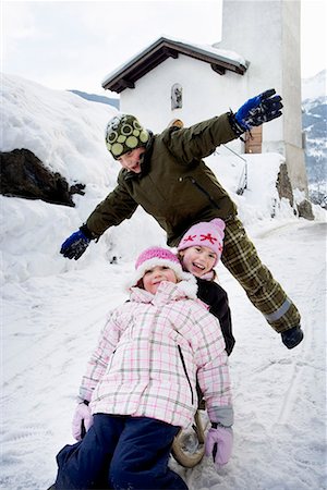 portrait screaming girl - Children sledging down slope Stock Photo - Premium Royalty-Free, Code: 649-02053541