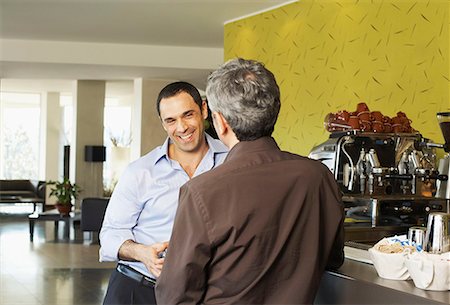 eating out mature - Two males enjoying a drink at bar Stock Photo - Premium Royalty-Free, Code: 649-02053777