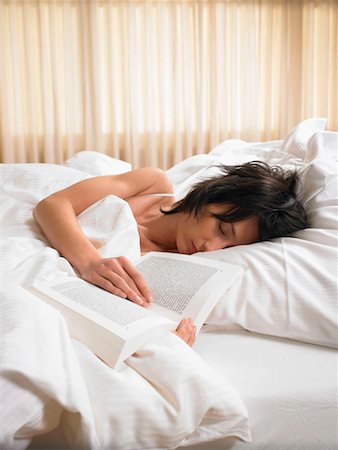 simsearch:649-03566257,k - Woman sleeping with an open book Stock Photo - Premium Royalty-Free, Code: 649-02198931