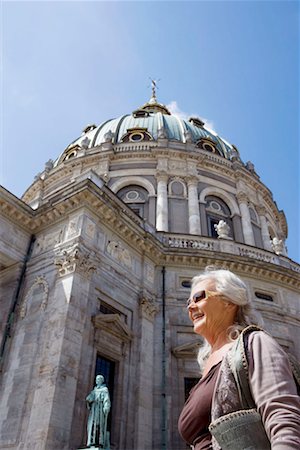 senior woman alone church - Woman in front of church Stock Photo - Premium Royalty-Free, Code: 649-02199609