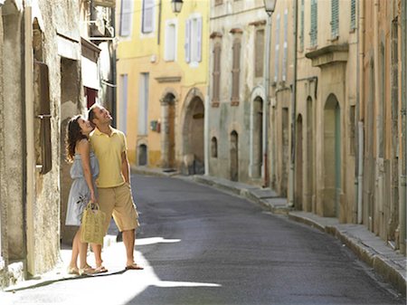 simsearch:649-03566314,k - Couple in street looking up Stock Photo - Premium Royalty-Free, Code: 649-02424378
