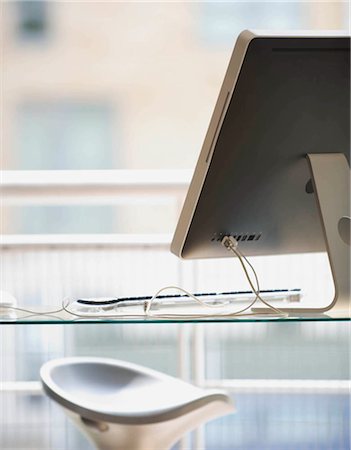 empty desk in office - Still life image of a desktop computer Stock Photo - Premium Royalty-Free, Code: 649-02423433