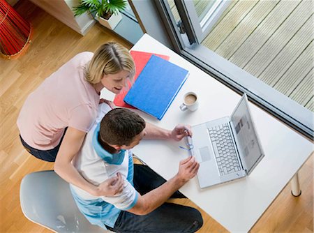 stress coffee - A couple looking at a laptop Stock Photo - Premium Royalty-Free, Code: 649-02423464